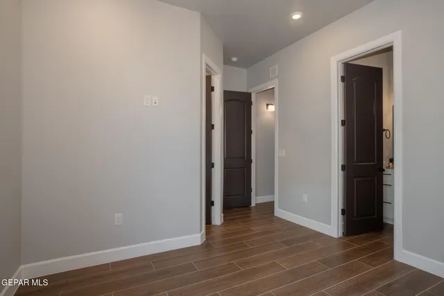 a living room with a couch and a window