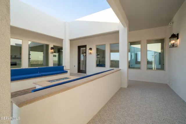 a view of a swimming pool and a yard