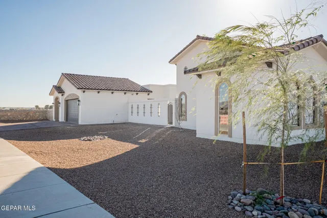 a view of backyard of garage