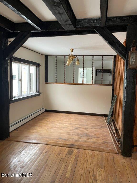 18 West Mountain Road Cheshire, MA 01225 - Photo 11 of 29 a view of an empty room with wooden floor and a window