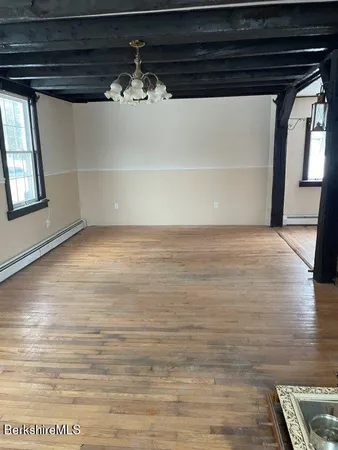 a view of a room with an empty space