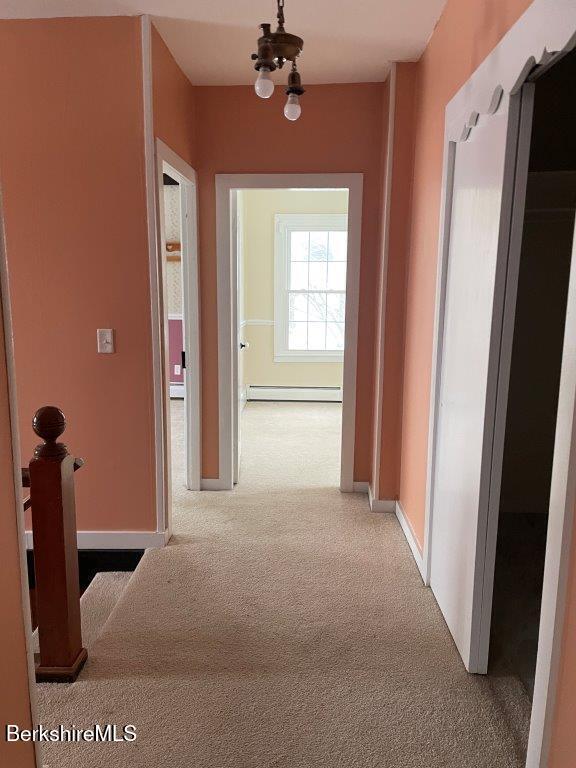 18 West Mountain Road Cheshire, MA 01225 - Photo 18 of 29 a view of a livingroom with a chandelier fan and windows