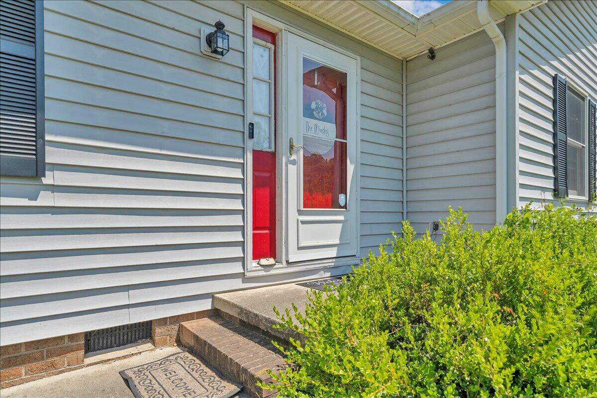 3870 Goose Dam Road Rocky Mount, VA 24151 - Photo 3 of 44 a front view of a house with plants