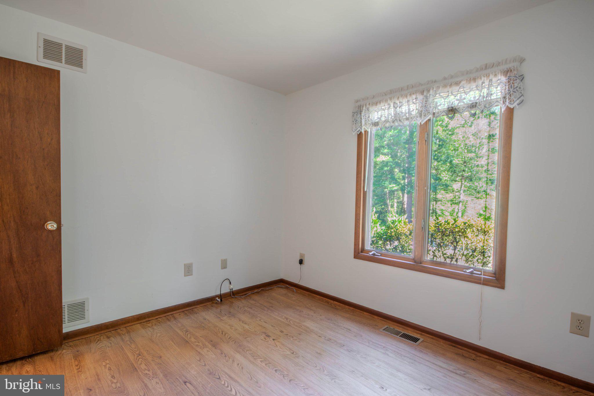 31749 Morris Leonard Road Parsonsburg, MD 21849 - Photo 17 of 40 Bright and airy room with nature views.