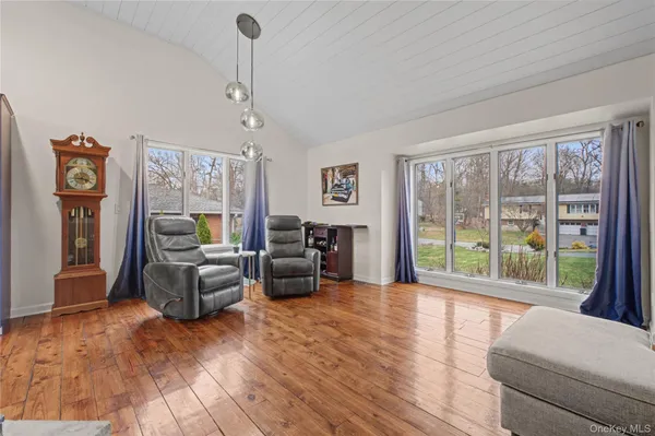 a kitchen with stainless steel appliances granite countertop a refrigerator and a stove