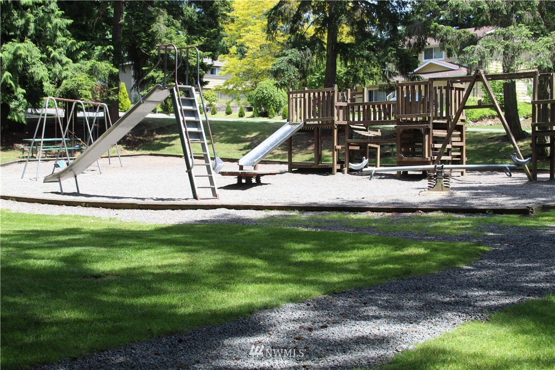 17515 Brook Boulevard Bothell, WA 98012 - Photo 30 of 36 a view of a house with a park