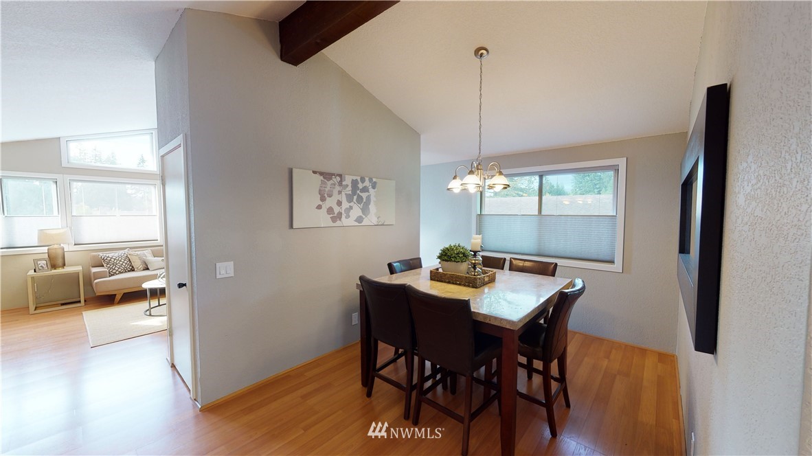 17515 Brook Boulevard Bothell, WA 98012 - Photo 7 of 36 a view of a dining room with furniture window and outside view