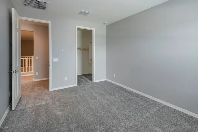 wooden floor and closet in a room