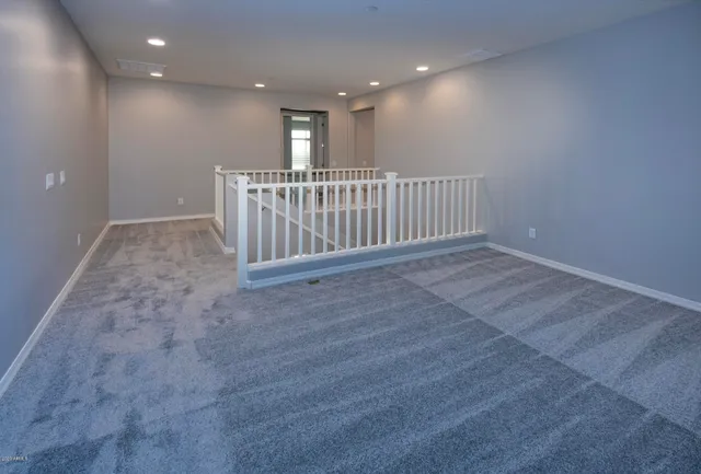 a view of hallway with stairs