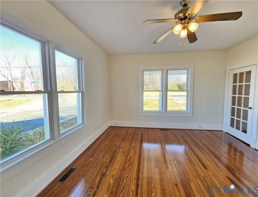 74 Conner Street Dillwyn, VA 23936 - Photo 14 of 46 a view of an empty room with wooden floor and a window