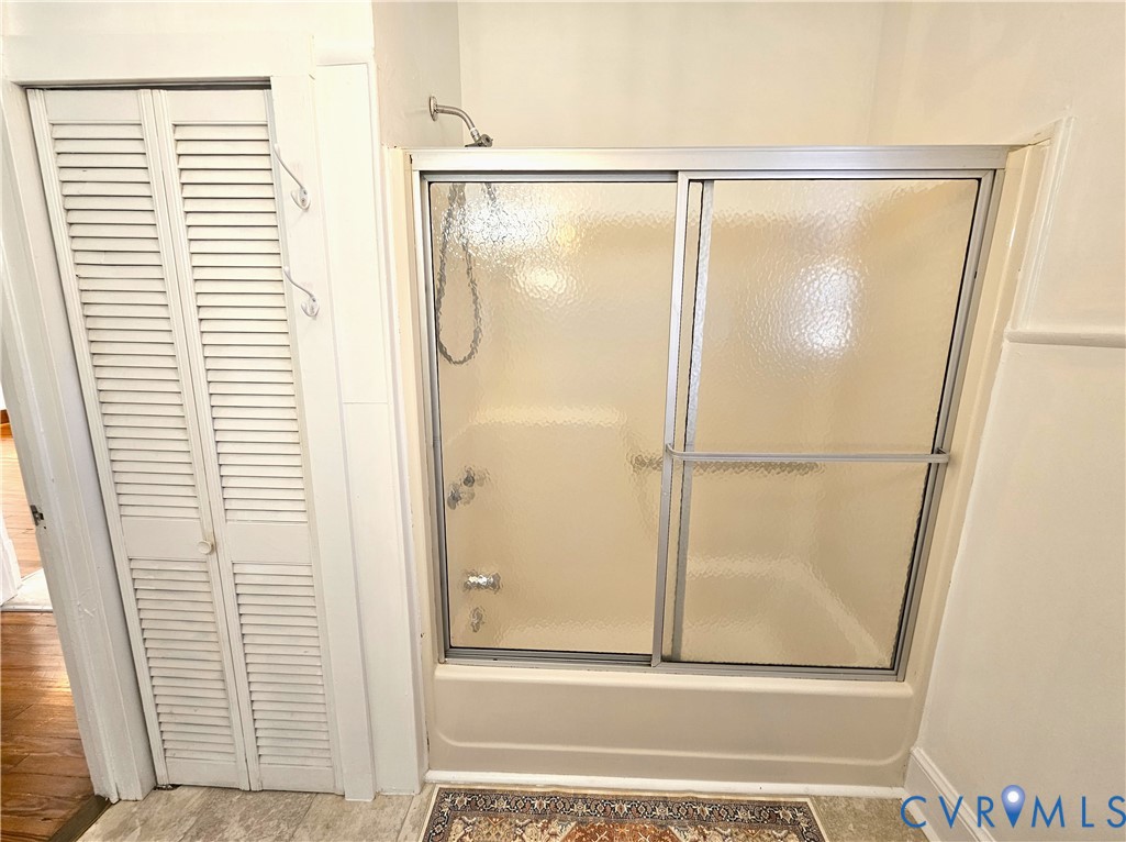 74 Conner Street Dillwyn, VA 23936 - Photo 16 of 46 a bathroom with a glass shower door