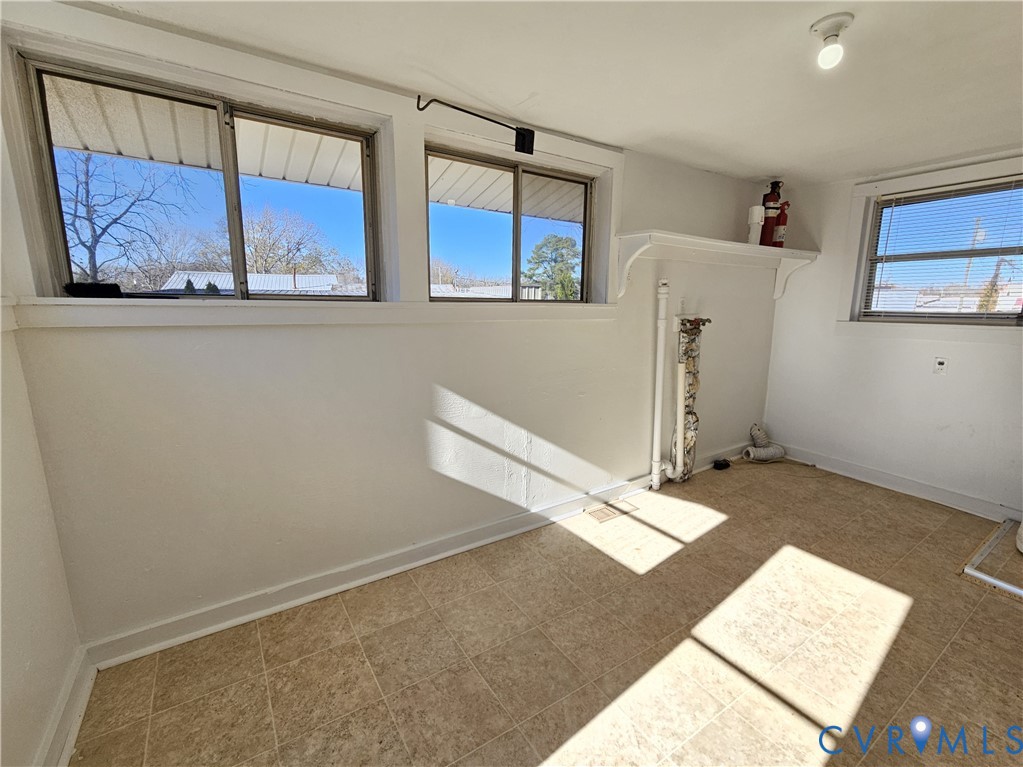 74 Conner Street Dillwyn, VA 23936 - Photo 32 of 46 a view of a bedroom with wooden floor and cabinet