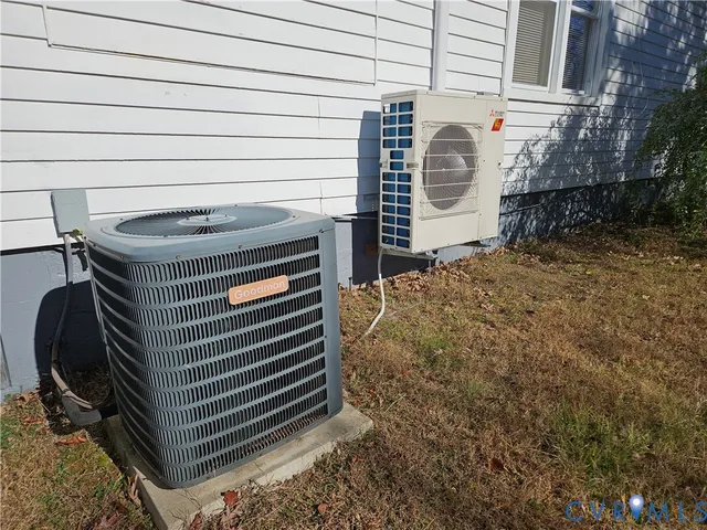 a utility room with dryer and shower