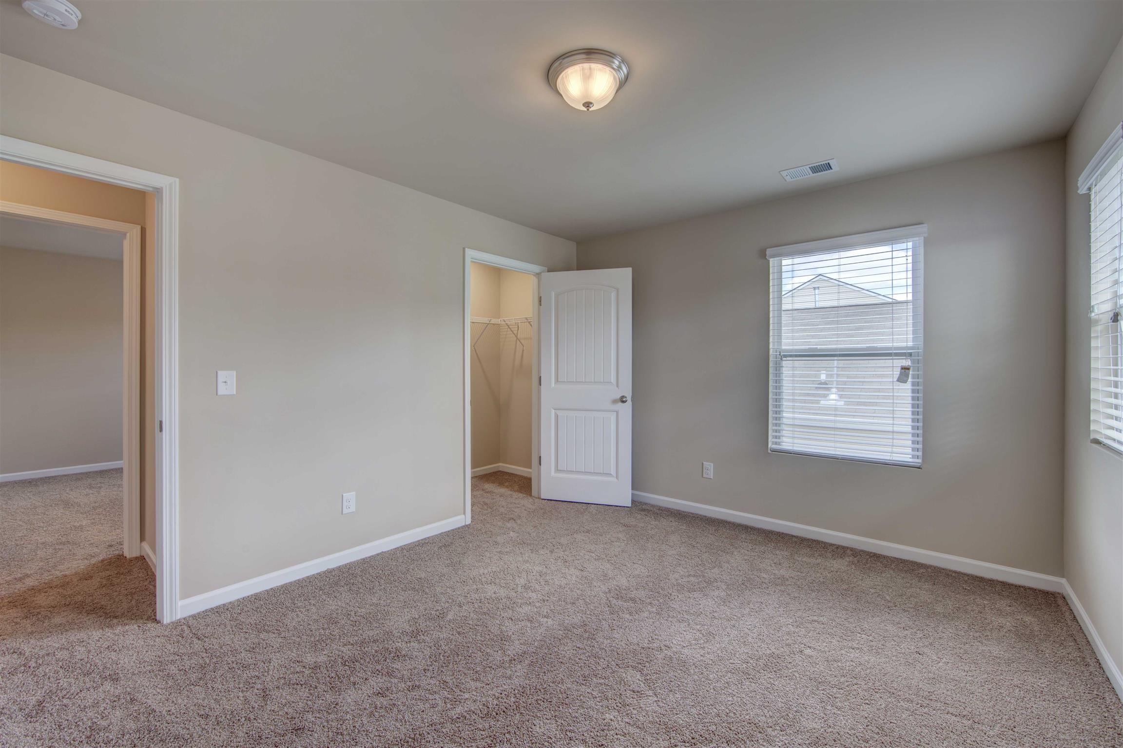 754 Prominence Road, Unit 71 Columbia, TN 38401 - Photo 27 of 28 a view of an empty room with a window