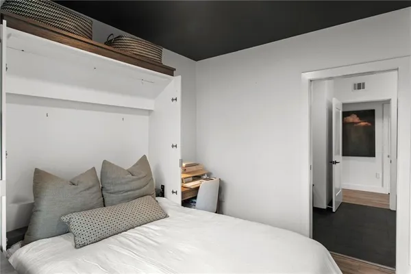 a view of room with furniture and closet