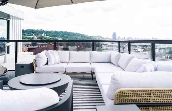 a living room with furniture and a couch