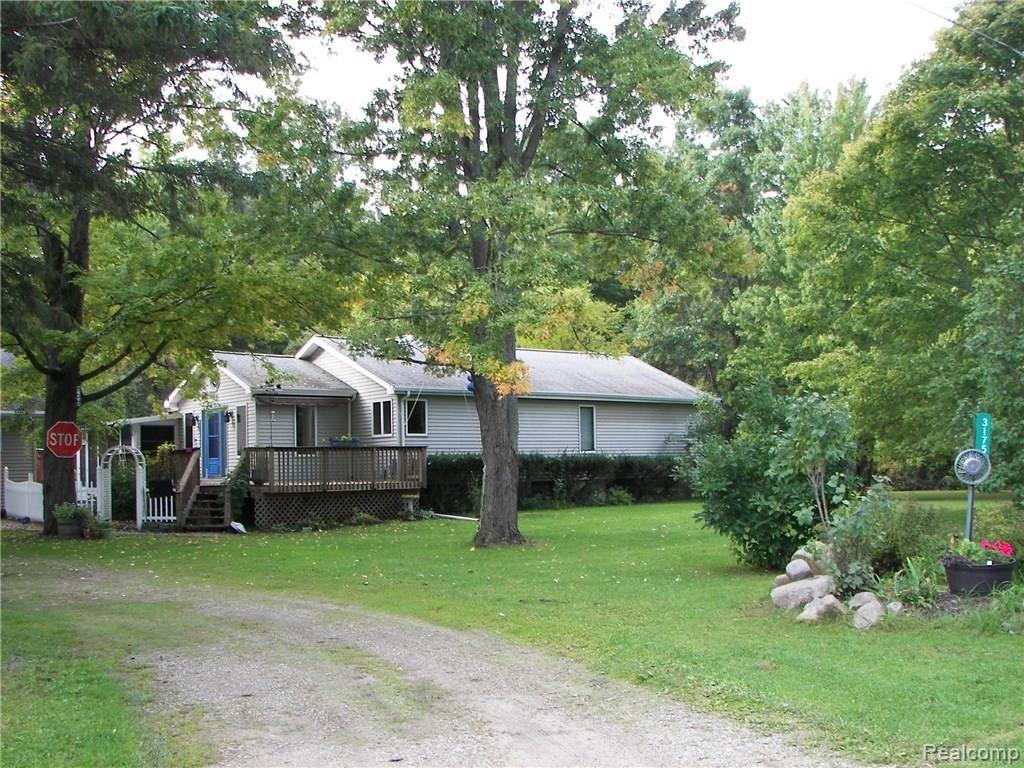3175 Fisher Road Howell, MI 48855 - Photo 1 of 32 Front of house as seen from Hoskins Dr.