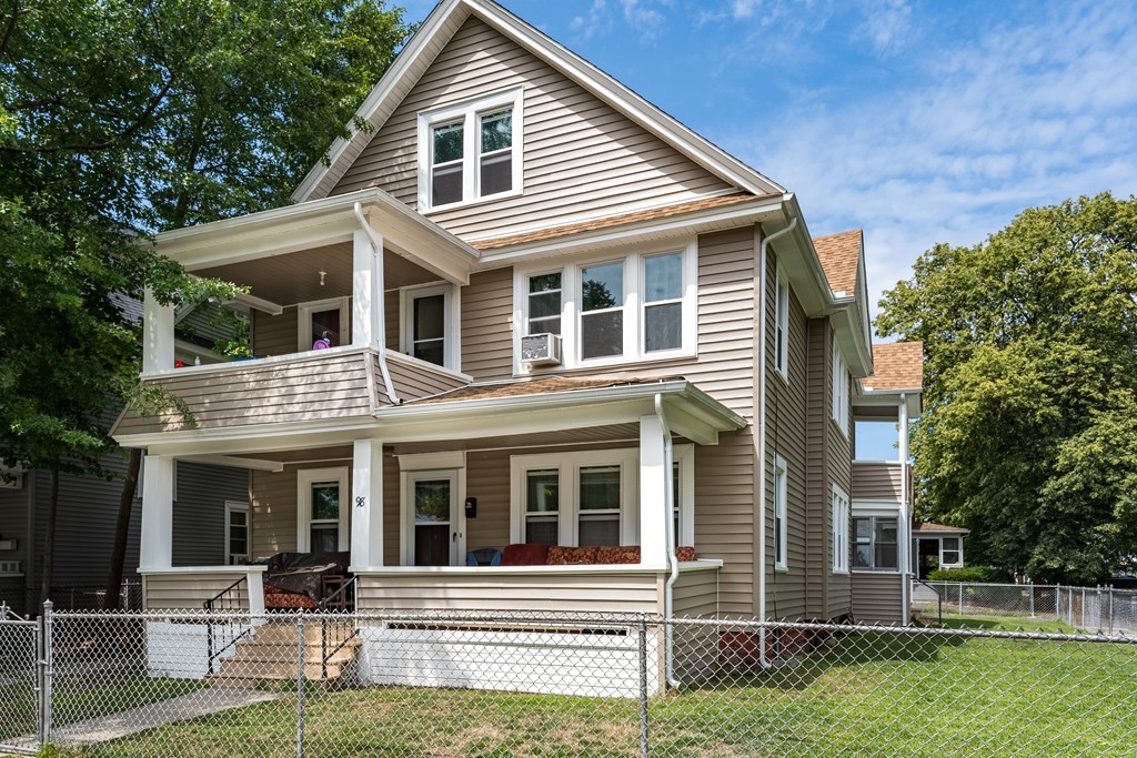 96-98 Johnson Street Springfield, MA 01108 - Photo 1 of 38 a front view of a house with a yard