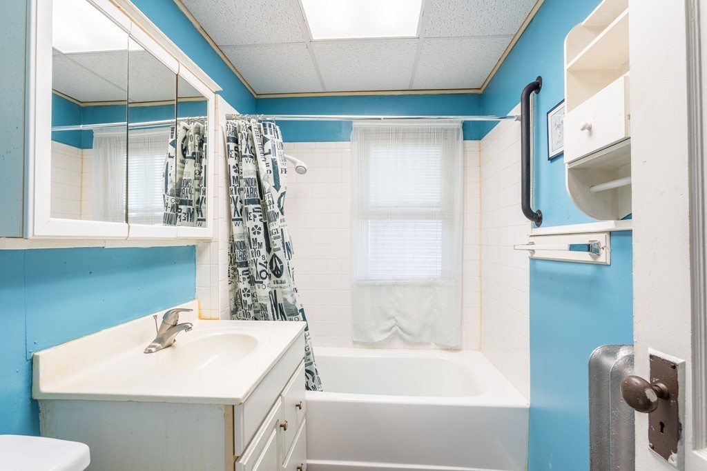 96-98 Johnson Street Springfield, MA 01108 - Photo 19 of 38 a bathroom with a sink a toilet and shower