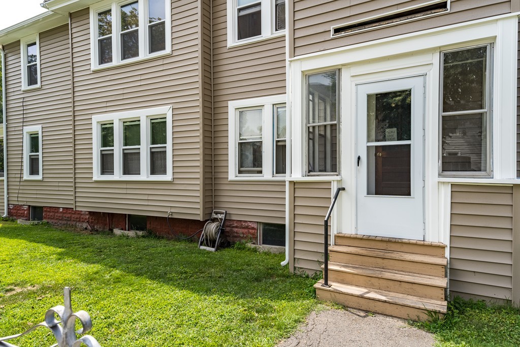96-98 Johnson Street Springfield, MA 01108 - Photo 35 of 38 a view of a house with a yard