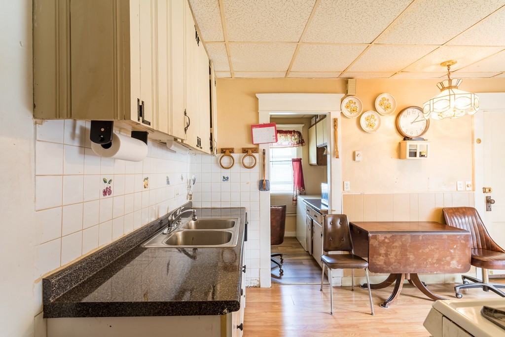 96-98 Johnson Street Springfield, MA 01108 - Photo 4 of 38 a kitchen with a sink and a stove top oven