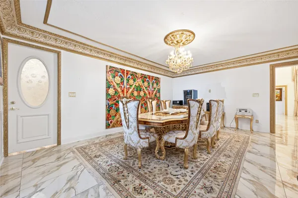 a view of a dining room with furniture