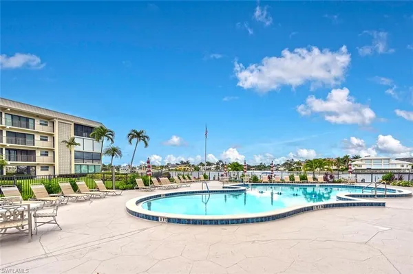 a view of a swimming pool and outside space