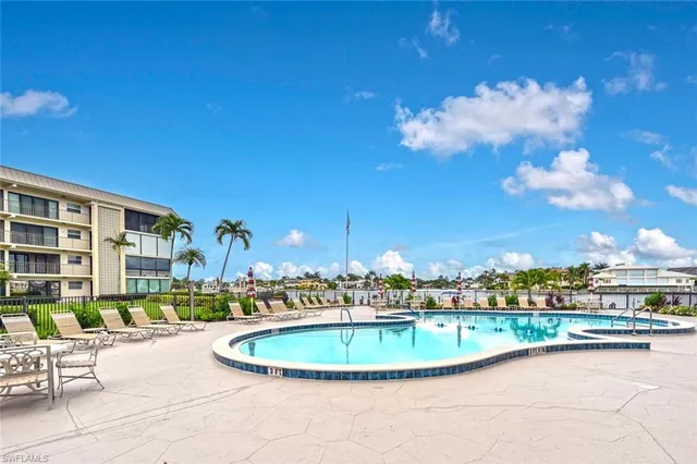 a view of a swimming pool and outside space