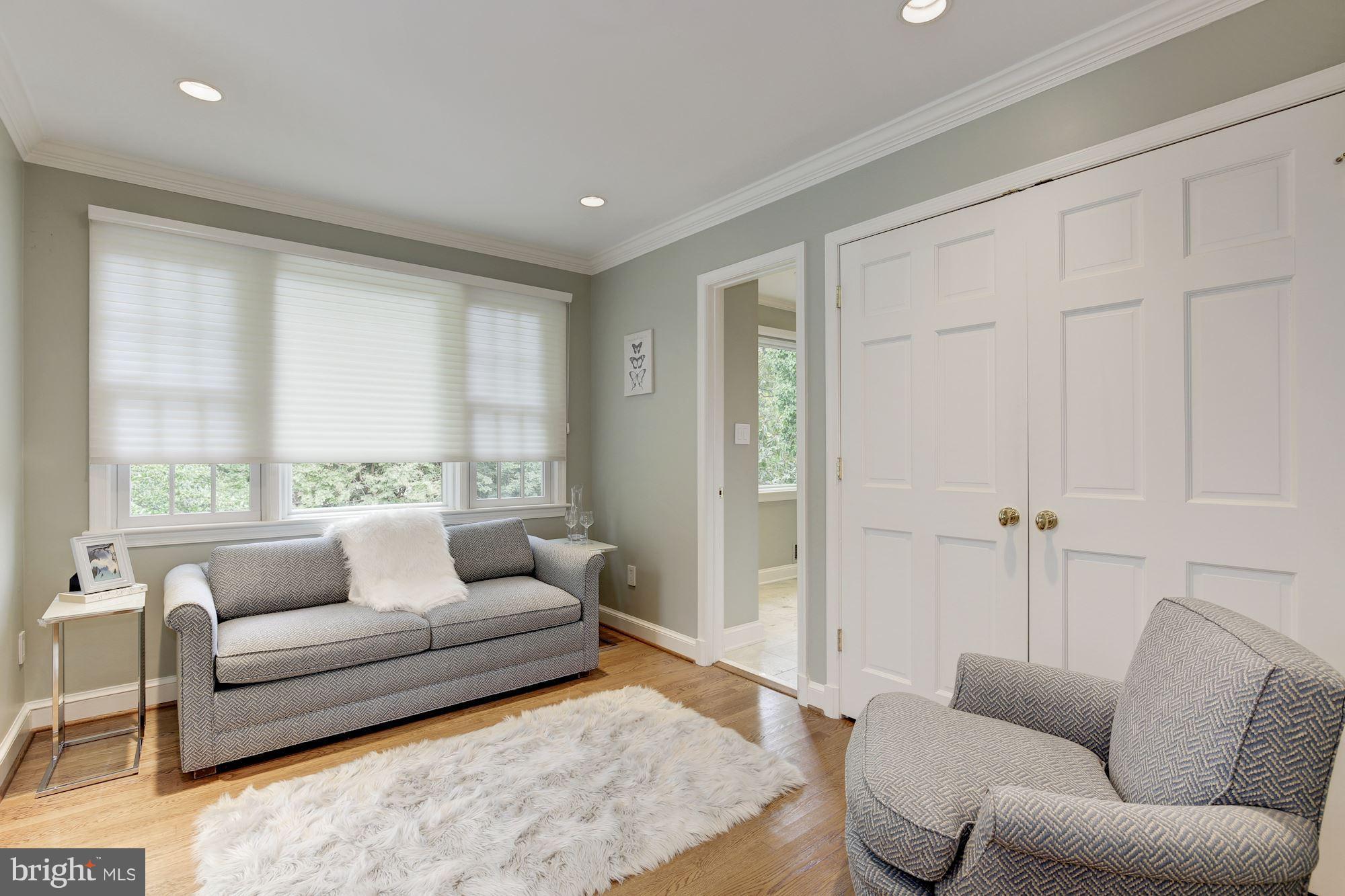 2205 46th Street Northwest Washington, DC 20007 - Photo 15 of 30 a living room with furniture and a couch