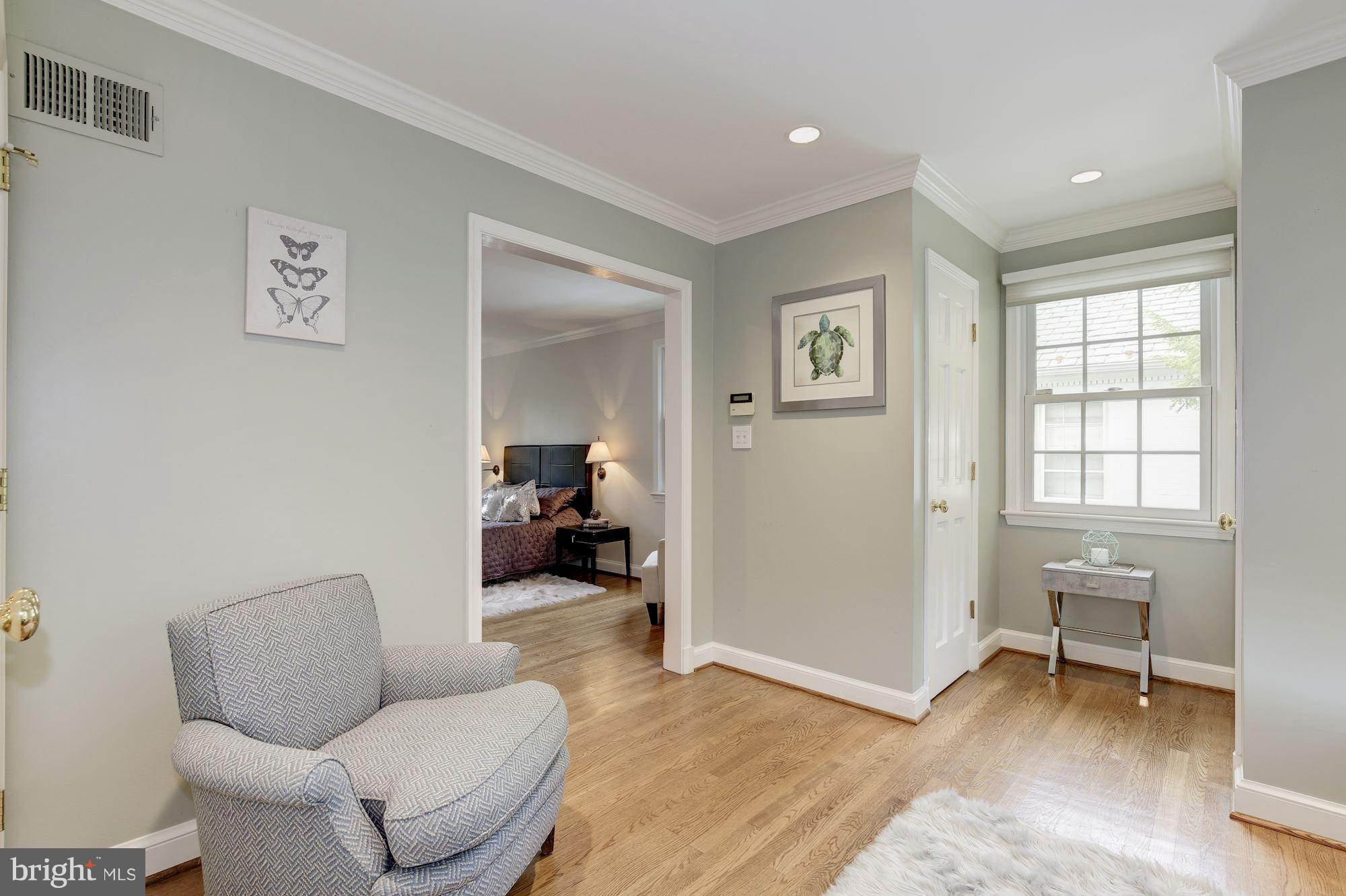 2205 46th Street Northwest Washington, DC 20007 - Photo 16 of 30 a living room with furniture and a window
