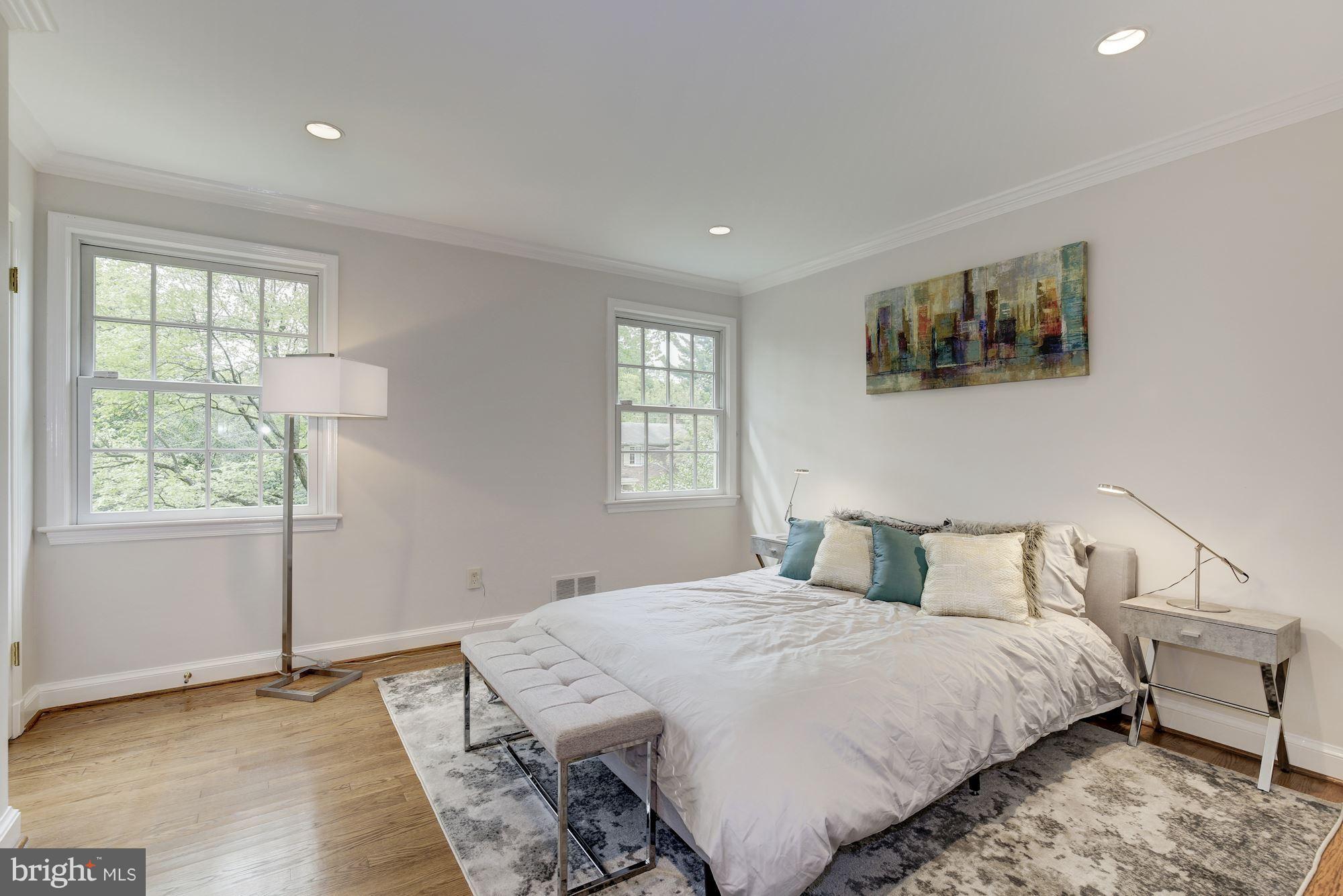 2205 46th Street Northwest Washington, DC 20007 - Photo 18 of 30 a bedroom with a bed and a window