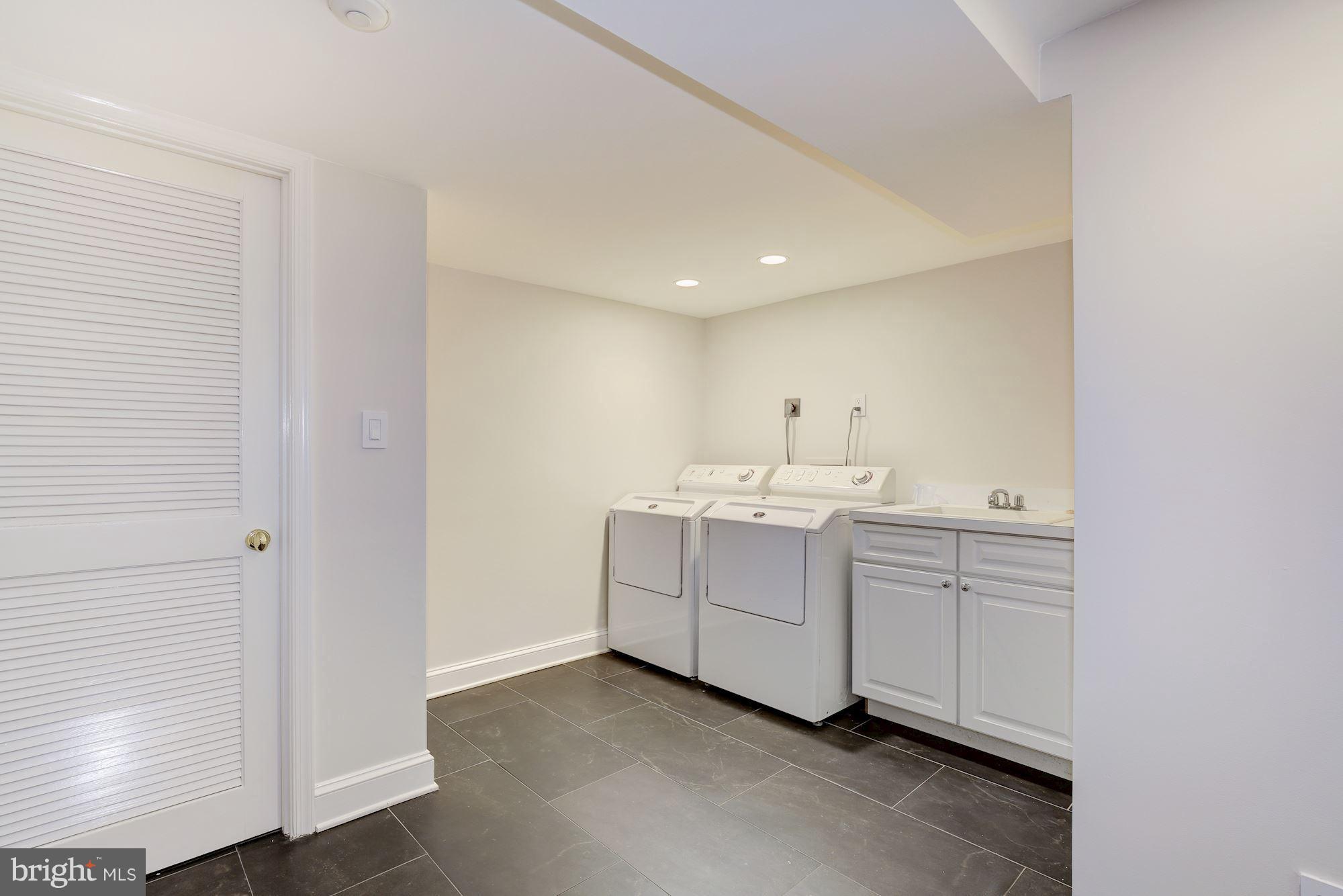 2205 46th Street Northwest Washington, DC 20007 - Photo 27 of 30 a view of cabinets and wooden floor
