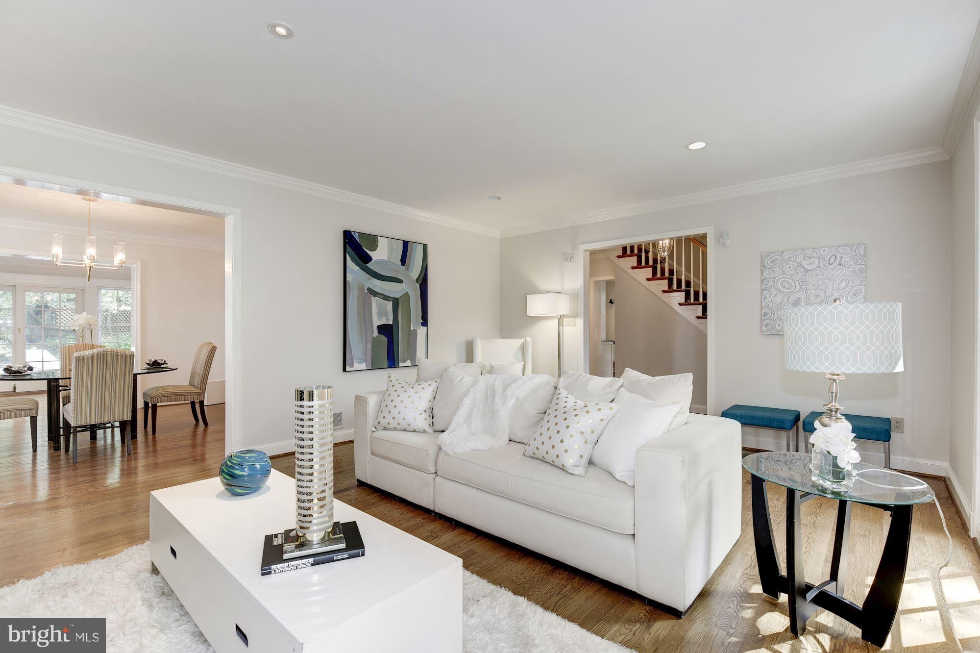 2205 46th Street Northwest Washington, DC 20007 - Photo 5 of 30 a living room with furniture and wooden floor