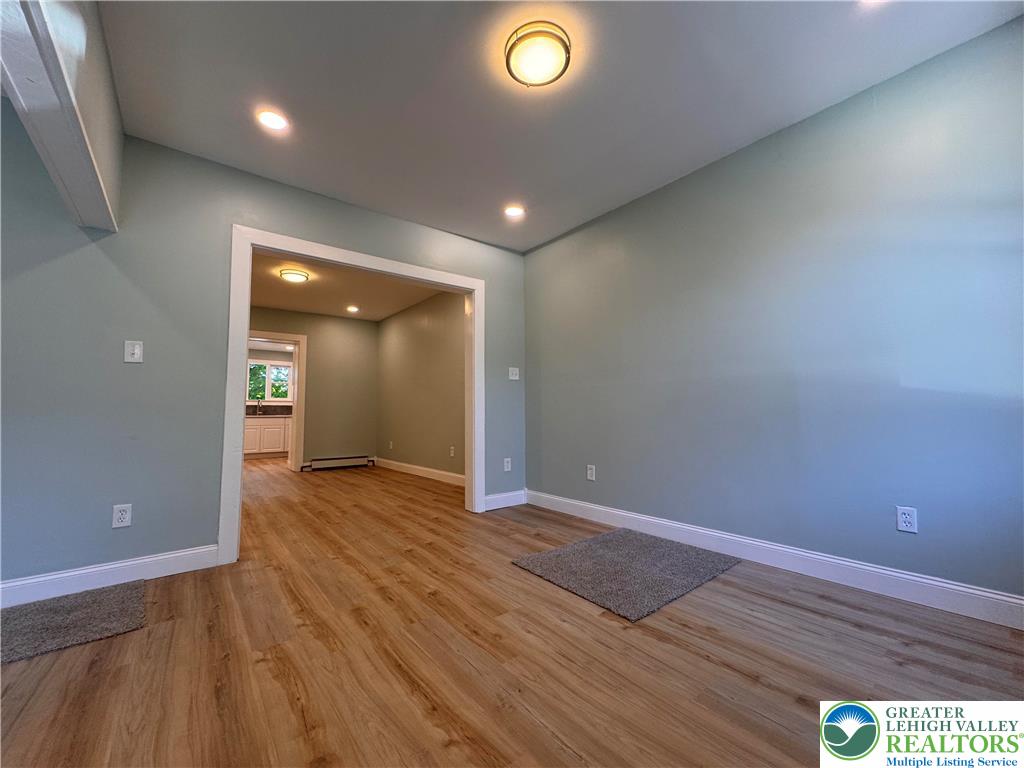 35 North 5th Street Easton, PA 18042 - Photo 11 of 96 an empty room with wooden floor and windows