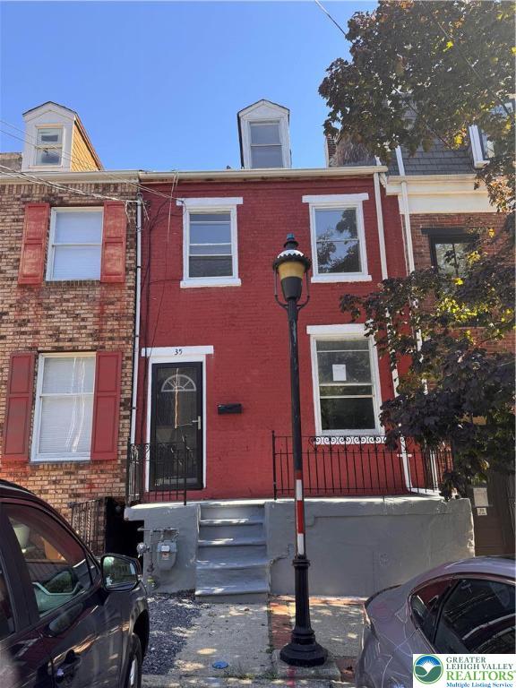 35 North 5th Street Easton, PA 18042 - Photo 3 of 96 a front view of a house with a yard