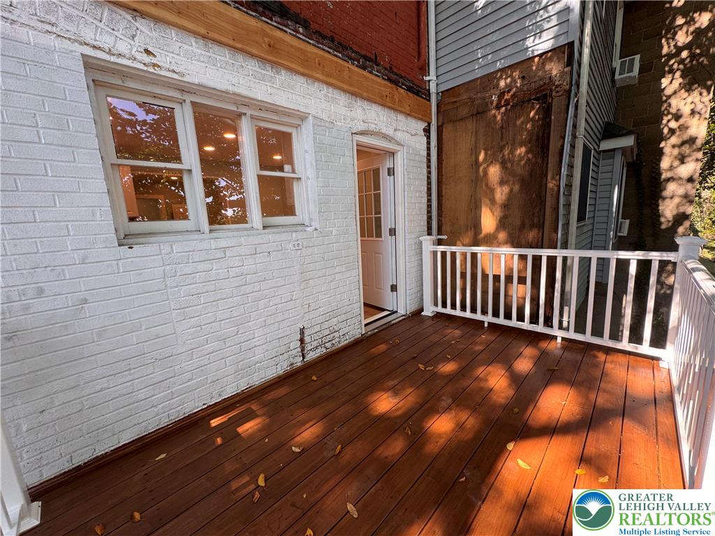 35 North 5th Street Easton, PA 18042 - Photo 32 of 96 a view of backyard with deck and wooden floor