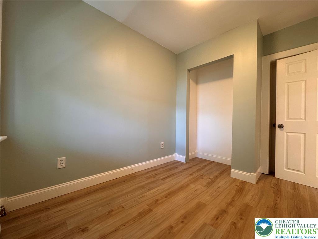 35 North 5th Street Easton, PA 18042 - Photo 37 of 96 an empty room with wooden floor and windows