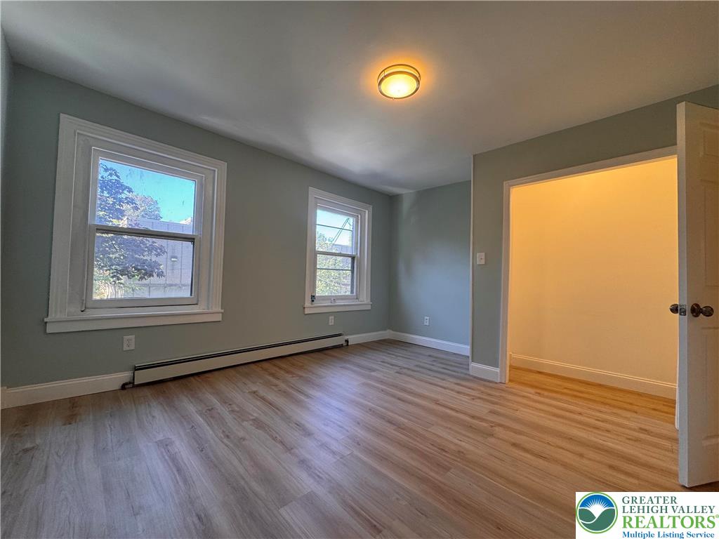 35 North 5th Street Easton, PA 18042 - Photo 51 of 96 a view of an empty room with wooden floor and a window
