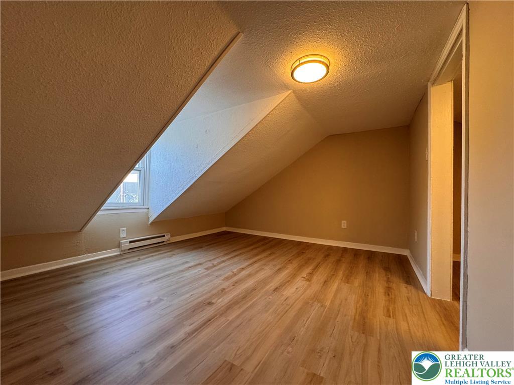 35 North 5th Street Easton, PA 18042 - Photo 64 of 96 a view of an empty room with wooden floor