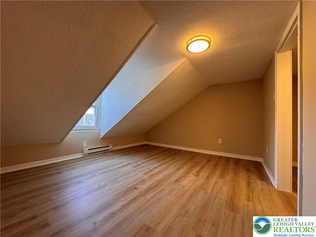 35 North 5th Street Easton, PA 18042 - Photo 65 of 96 a view of an empty room with wooden floor