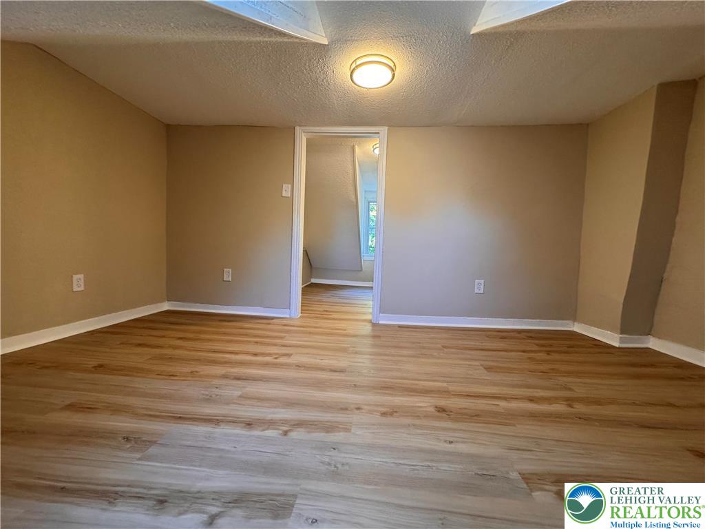 35 North 5th Street Easton, PA 18042 - Photo 67 of 96 a view of an empty room with wooden floor