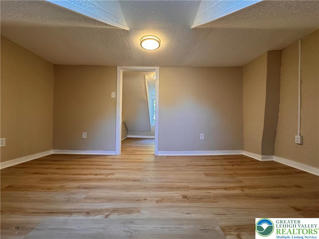 35 North 5th Street Easton, PA 18042 - Photo 68 of 96 a view of an empty room with wooden floor