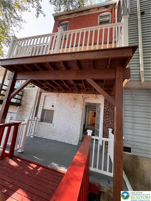 35 North 5th Street Easton, PA 18042 - Photo 93 of 96 a view of a patio with table and chairs with wooden floor and fence