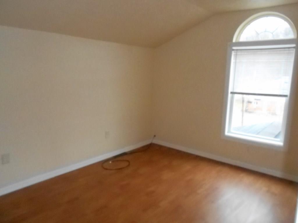 173 Varsity Road Masontown, PA 15461 - Photo 14 of 21 2nd bedroom with geometric window.