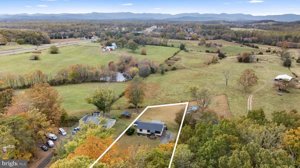 a view of a lake from a yard