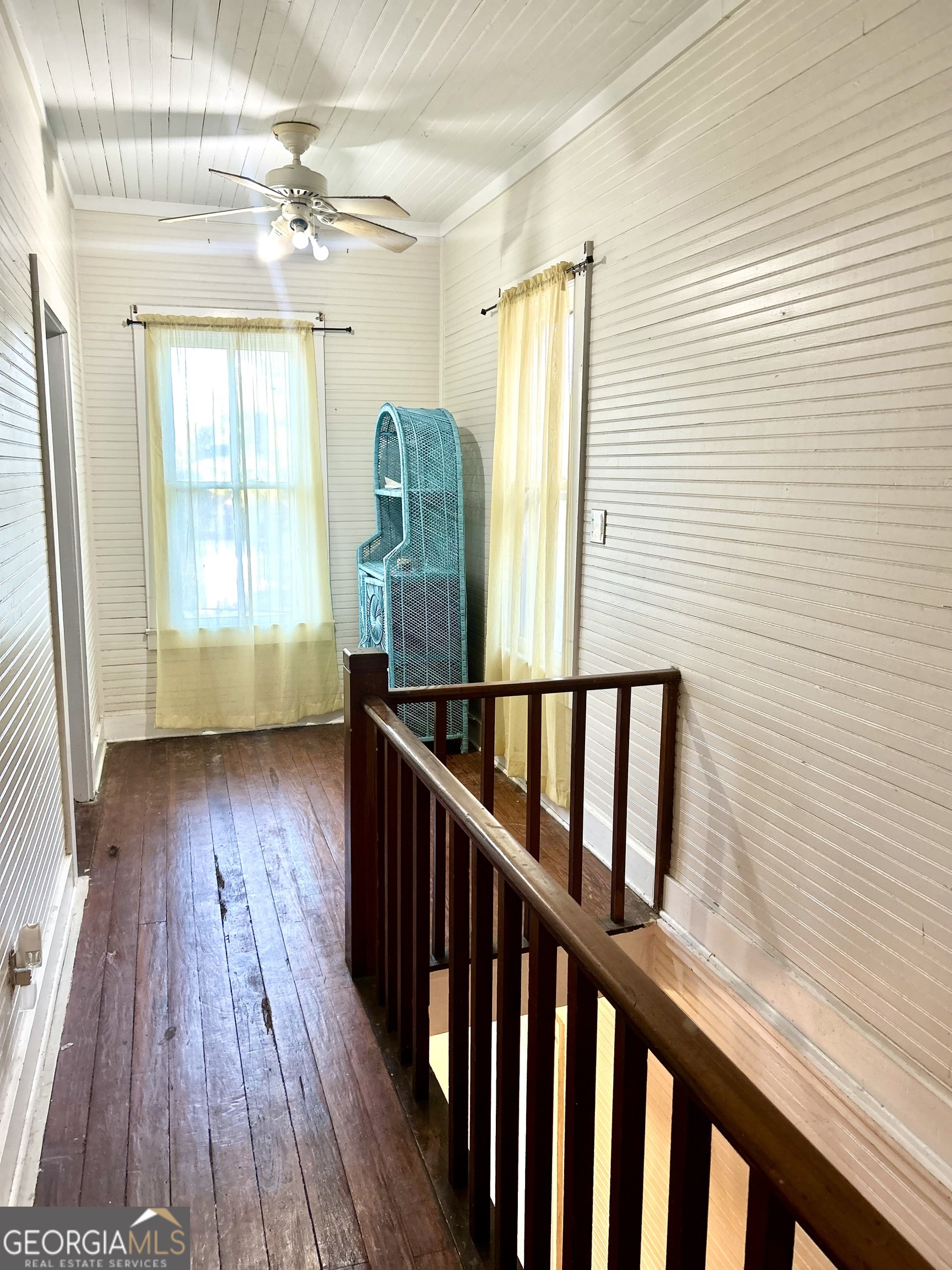2123 Ellis Street Brunswick, GA 31520 - Photo 19 of 19 a view of a room with wooden floor and staircase