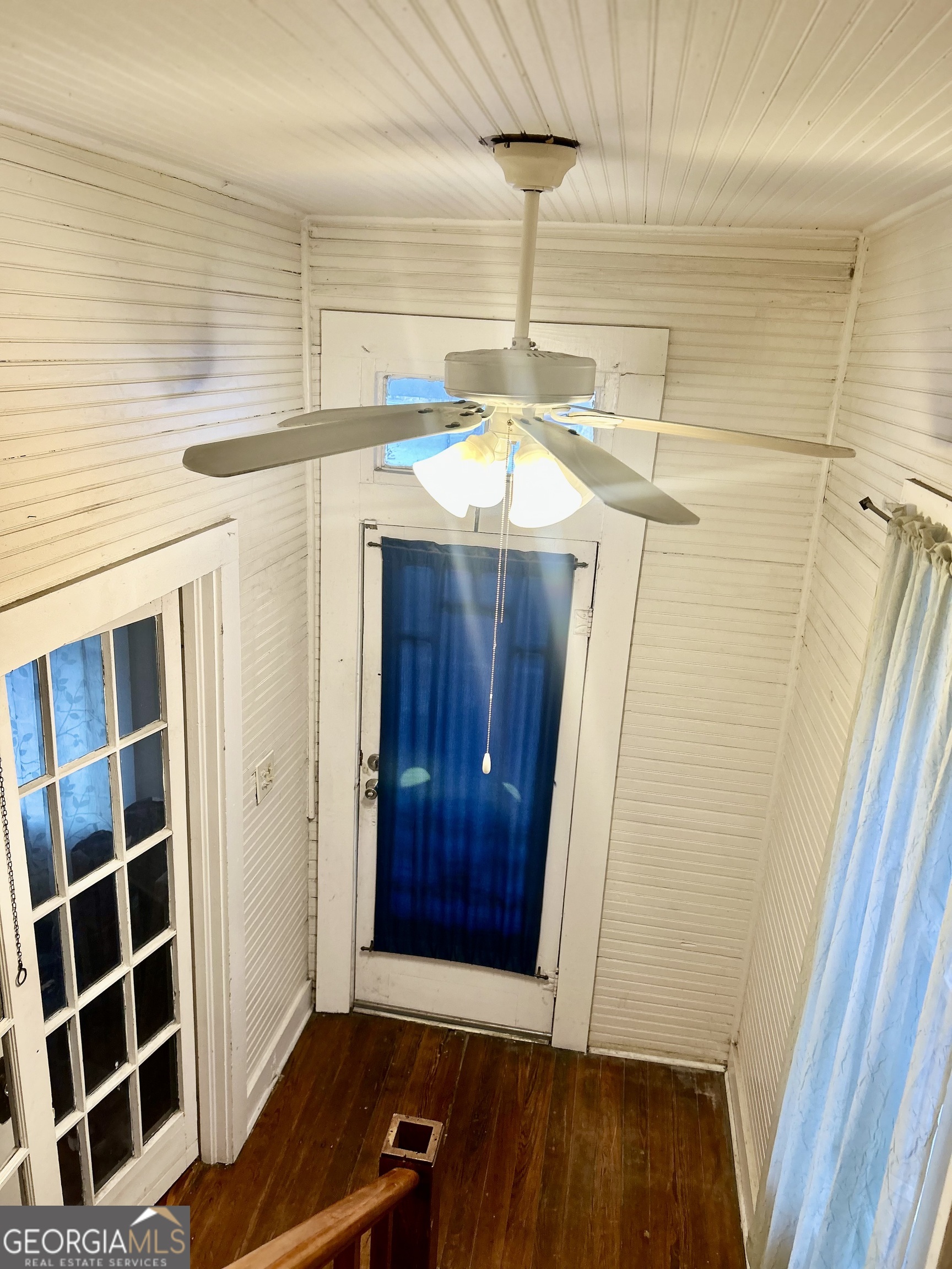 2123 Ellis Street Brunswick, GA 31520 - Photo 5 of 19 a view of room with window and wooden floor