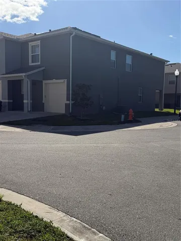 a roof deck with a yard