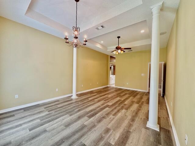 2024 Grayson Drive Navarre, FL 32566 - Photo 18 of 47 a view of a livingroom with a chandelier fan and wooden floor