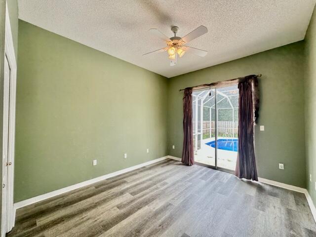 2024 Grayson Drive Navarre, FL 32566 - Photo 30 of 47 a view of an empty room with a window